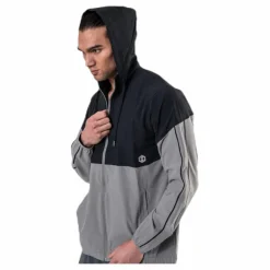 Athlete Recovery Woven Warm Up Top Green